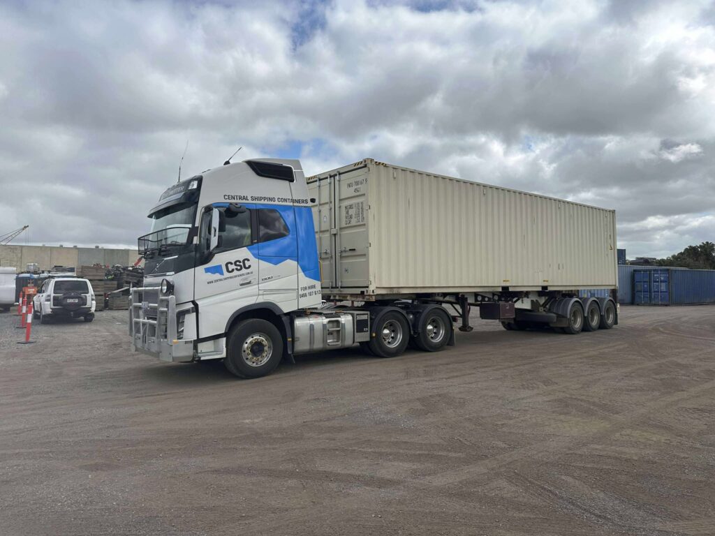 Regular tilt truck moving shipping containers